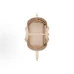 DIOR Toujours, a medium-sized women\'s handbag with a light gold finish, metal logo, pendant and buckle, in pink and beige