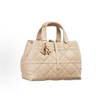 DIOR Toujours, a medium-sized women\'s handbag with a light gold finish, metal logo, pendant and buckle, in pink and beige