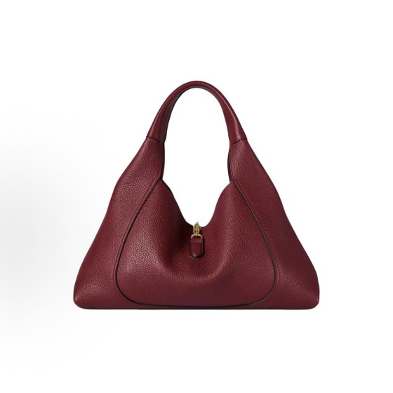 GUCCI Softbit series features a patchwork design with gold hardware, a large women\'s backpack and handbag in encore red