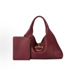 GUCCI Softbit series features a patchwork design with gold hardware, a large women\'s backpack and handbag in encore red