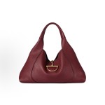 GUCCI Softbit series features a patchwork design with gold hardware, a large women\'s backpack and handbag in encore red