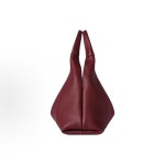 GUCCI Softbit series features a patchwork design with gold hardware, a large women\'s backpack and handbag in encore red
