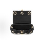 LOUIS VUITTON Favorite large monogram patterned embossed dumpling bag, black and off-white